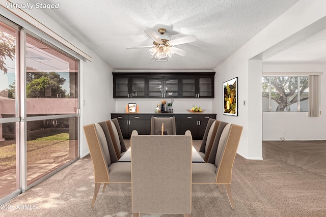 518 N Cheri Lynn Dr, Chandler, AZ 85225 - dining space with light colored carpet, a textured ceiling, and ceiling fan