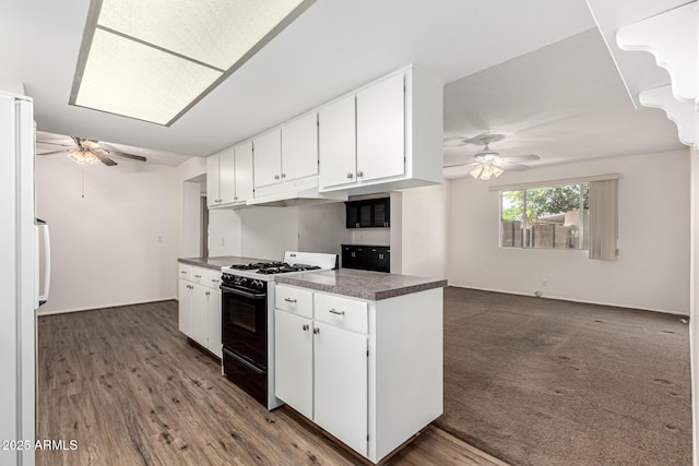 518 N Cheri Lynn Dr, Chandler, AZ 85225 - kitchen featuring gas range oven, a ceiling fan, freestanding refrigerator, and under cabinet range hood
