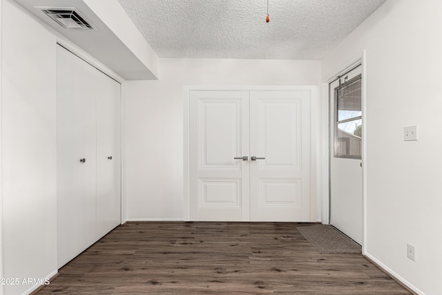 518 N Cheri Lynn Dr, Chandler, AZ 85225 - hallway with a textured ceiling and wood finished floors