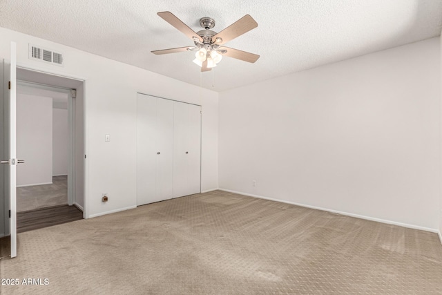 518 N Cheri Lynn Dr, Chandler, AZ 85225 - unfurnished bedroom featuring carpet, baseboards, a closet, ceiling fan, and a textured ceiling