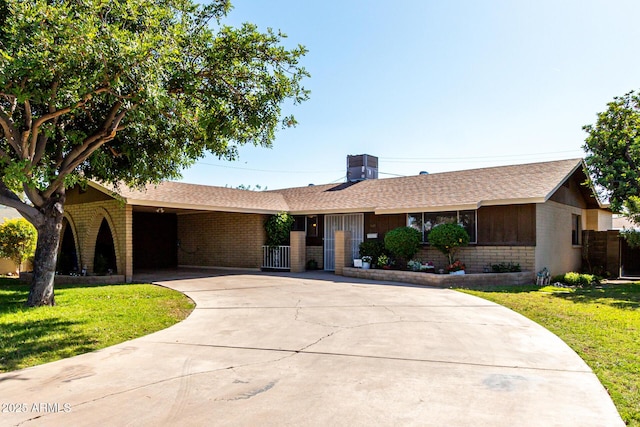518 N Cheri Lynn Dr, Chandler, AZ 85225 - ranch-style house with brick siding, driveway, a chimney, and a shingled roof
