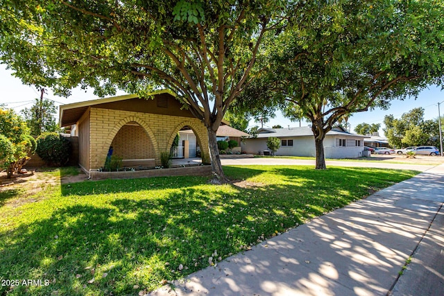 518 N Cheri Lynn Dr, Chandler, AZ 85225 - ranch-style house with a front lawn, brick siding, and driveway