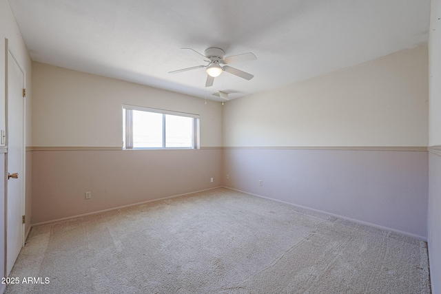 12611 N 112th Ave, Youngtown, AZ 85363 - empty room featuring ceiling fan, carpet, and baseboards