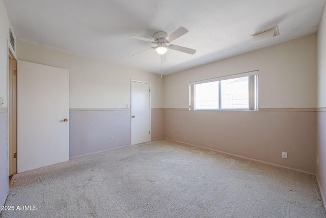 12611 N 112th Ave, Youngtown, AZ 85363 - carpeted empty room featuring ceiling fan