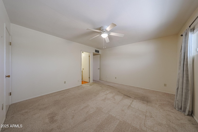 12611 N 112th Ave, Youngtown, AZ 85363 - empty room featuring ceiling fan, carpet floors, and baseboards