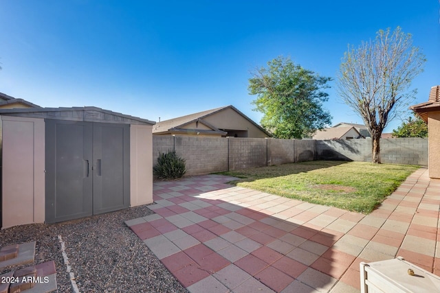 view of patio / terrace featuring a shed