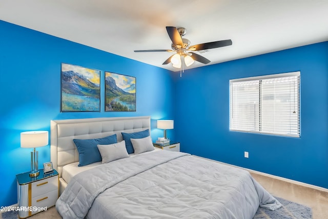 carpeted bedroom featuring ceiling fan