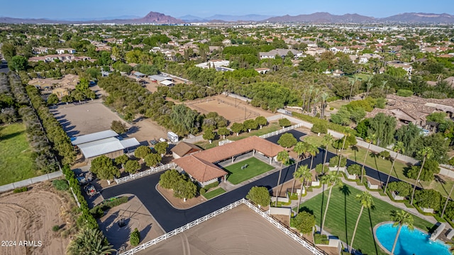 birds eye view of property with a mountain view