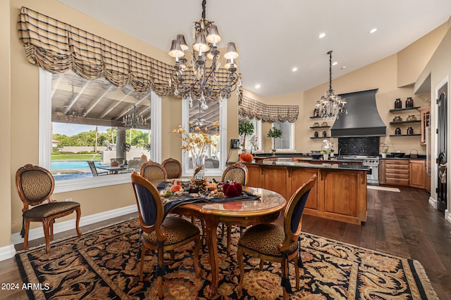 dining room with an inviting chandelier, lofted ceiling, dark hardwood / wood-style floors, and sink