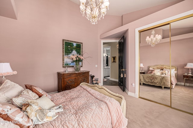 bedroom with high vaulted ceiling, carpet floors, a closet, and a chandelier