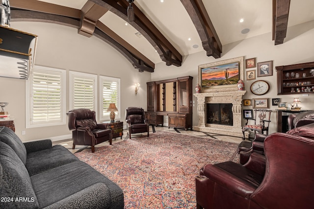 living room with a premium fireplace and lofted ceiling with beams