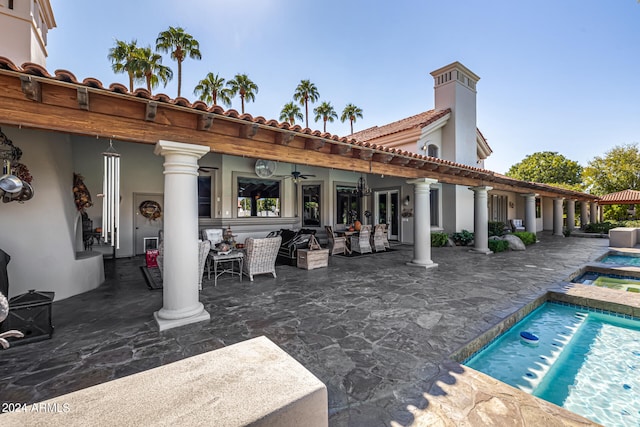 view of swimming pool featuring an outdoor hangout area, ceiling fan, and a patio area