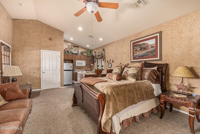 carpeted bedroom featuring ceiling fan, vaulted ceiling, and white fridge