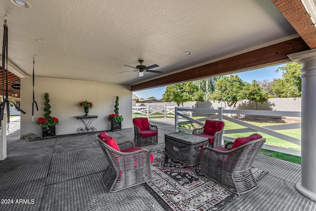 view of patio featuring ceiling fan and outdoor lounge area