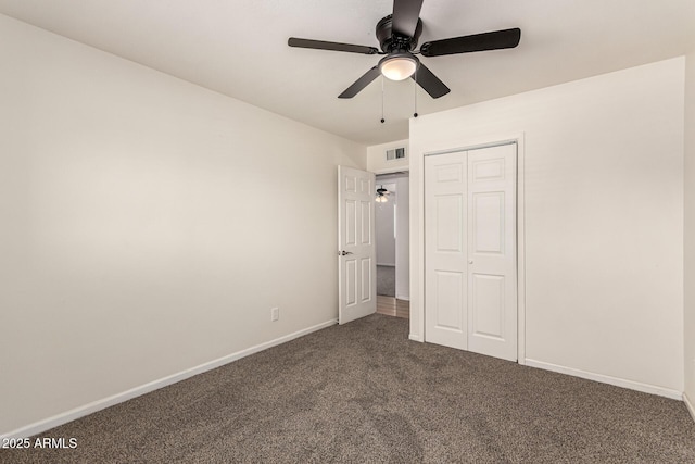 1203 E Bishop Dr, Tempe, AZ 85282 - unfurnished bedroom featuring dark colored carpet, a ceiling fan, baseboards, visible vents, and a closet