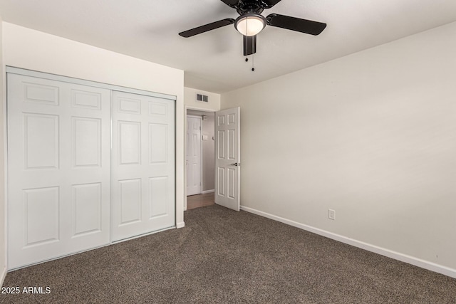 1203 E Bishop Dr, Tempe, AZ 85282 - unfurnished bedroom with a ceiling fan, visible vents, baseboards, a closet, and dark colored carpet