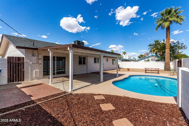 1203 E Bishop Dr, Tempe, AZ 85282 - view of swimming pool with a gate, a patio area, a fenced in pool, cooling unit, and a fenced backyard