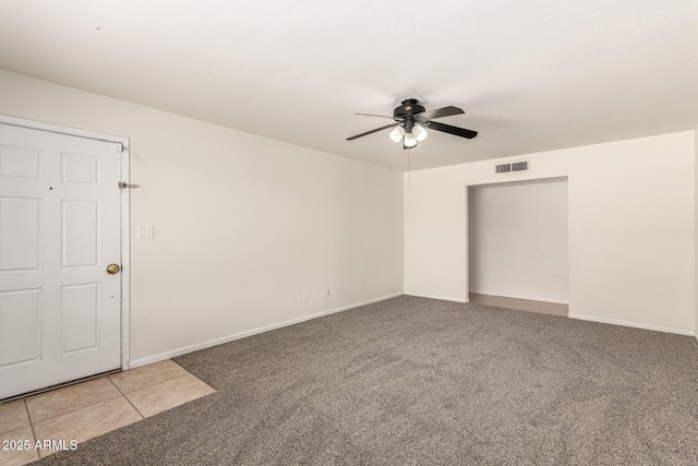 1203 E Bishop Dr, Tempe, AZ 85282 - unfurnished room featuring baseboards, ceiling fan, light colored carpet, and visible vents