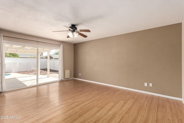 1203 E Bishop Dr, Tempe, AZ 85282 - empty room with baseboards, light wood finished floors, and ceiling fan