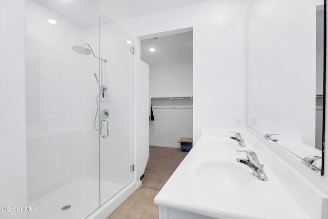22560 E Rosa Rd, Queen Creek, AZ 85142 - full bathroom with a stall shower, a spacious closet, tile patterned flooring, double vanity, and recessed lighting