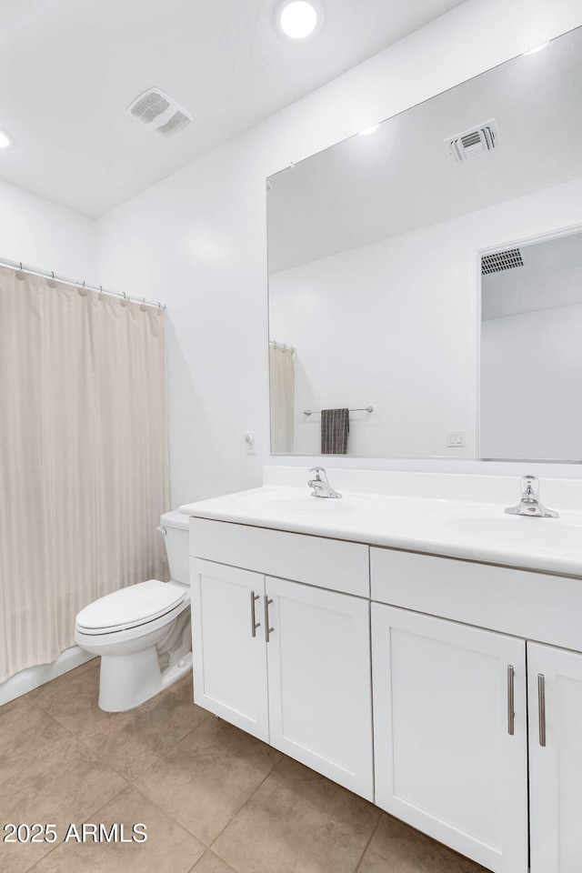 22560 E Rosa Rd, Queen Creek, AZ 85142 - full bathroom with toilet, double vanity, tile patterned flooring, and curtained shower