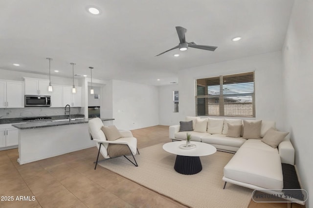 22560 E Rosa Rd, Queen Creek, AZ 85142 - living area with ceiling fan, recessed lighting, and light tile patterned flooring