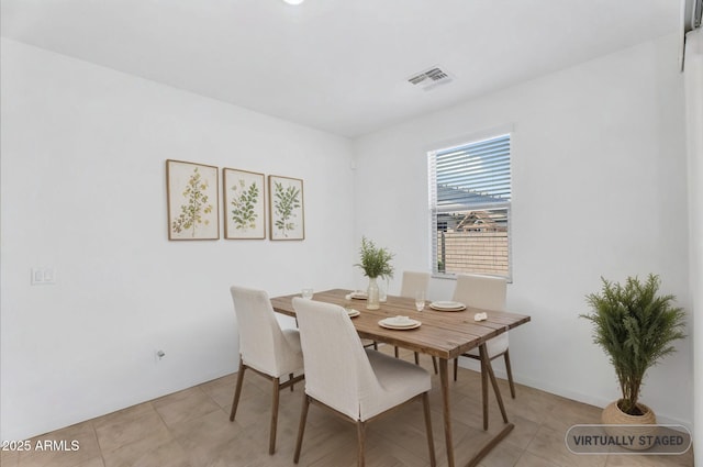 22560 E Rosa Rd, Queen Creek, AZ 85142 - dining room with light tile patterned flooring and baseboards