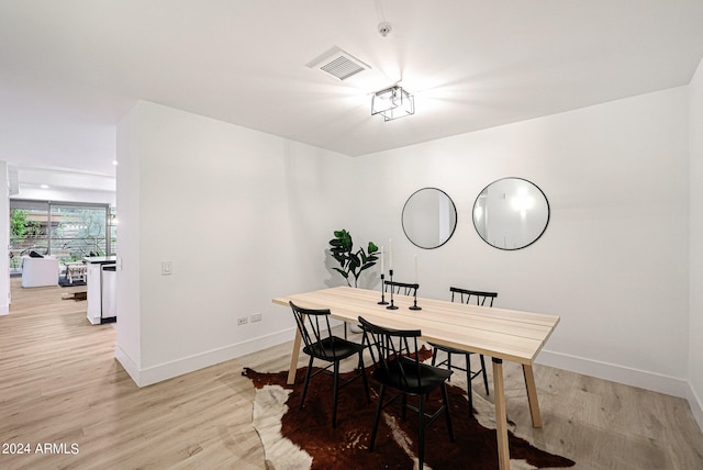 dining room featuring light hardwood / wood-style floors