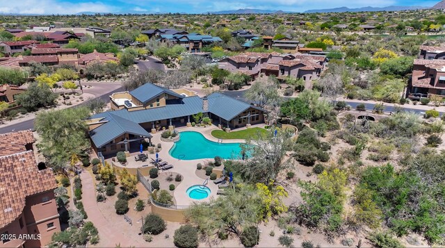 aerial view of residential area with a pool area