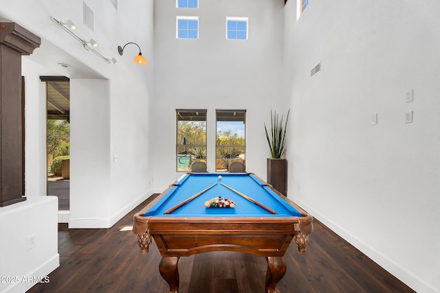 rec room with baseboards, wood finished floors, billiards, and a high ceiling
