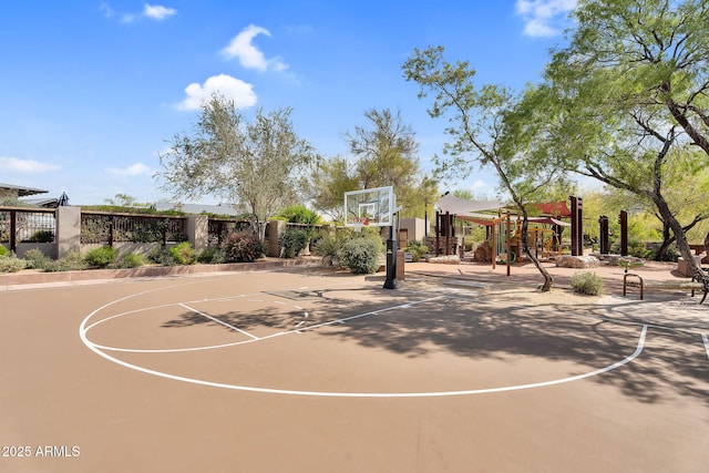 view of sport court with community basketball court and fence