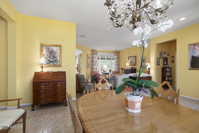 19714 N Concord Dr, Surprise, AZ 85374 - dining room with light tile patterned flooring, baseboards, a chandelier, and recessed lighting