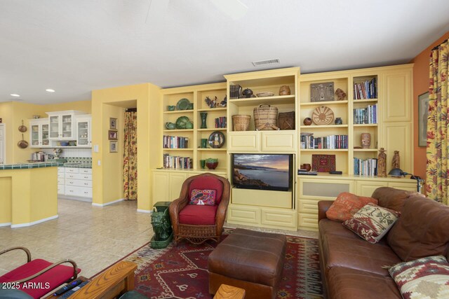 19714 N Concord Dr, Surprise, AZ 85374 - living area with baseboards, light tile patterned floors, and recessed lighting