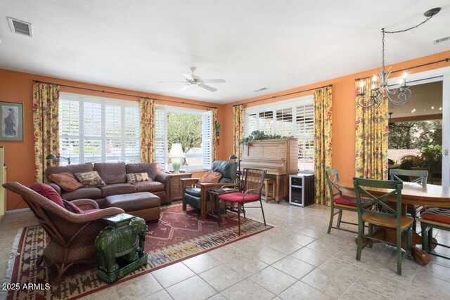 19714 N Concord Dr, Surprise, AZ 85374 - living area with a chandelier, ceiling fan, and tile patterned flooring