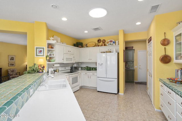 19714 N Concord Dr, Surprise, AZ 85374 - kitchen featuring white appliances, a sink, white cabinetry, open shelves, and light tile patterned floors