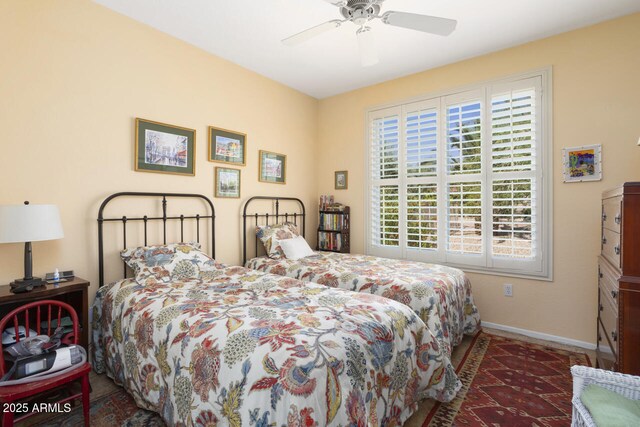19714 N Concord Dr, Surprise, AZ 85374 - bedroom with multiple windows, baseboards, and a ceiling fan