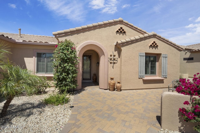 19714 N Concord Dr, Surprise, AZ 85374 - view of front facade with a tile roof and stucco siding