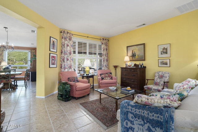 19714 N Concord Dr, Surprise, AZ 85374 - living area featuring a chandelier, baseboards, and light tile patterned floors