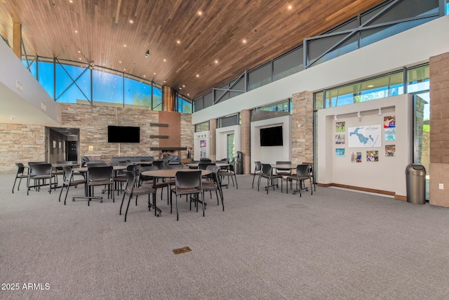 interior space with recessed lighting, wood ceiling, and a towering ceiling