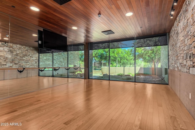 interior space featuring wooden ceiling