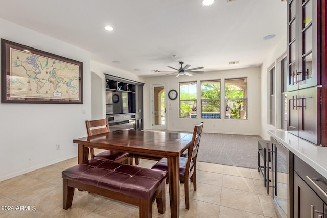 dining room featuring light tile patterned floors, wine cooler, visible vents, and recessed lighting