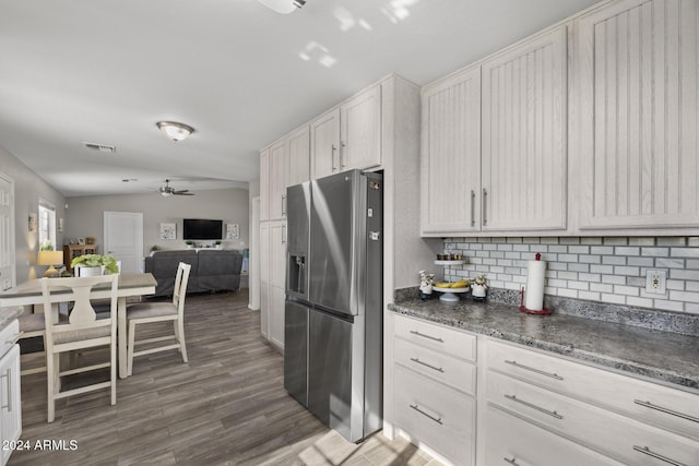 kitchen with stainless steel refrigerator with ice dispenser, ceiling fan, tasteful backsplash, dark hardwood / wood-style flooring, and white cabinetry