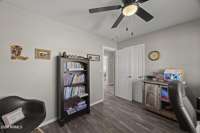 office space with ceiling fan and dark wood-type flooring