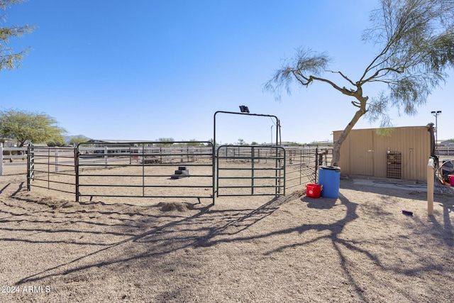 view of gate featuring a rural view