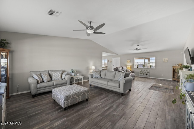 living room with dark hardwood / wood-style flooring, vaulted ceiling, and ceiling fan