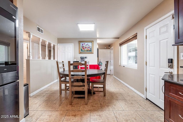 view of tiled dining space