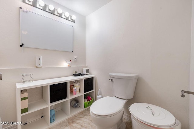 bathroom featuring toilet