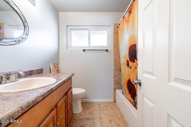 full bathroom featuring toilet, shower / tub combo, vanity, and tile patterned floors