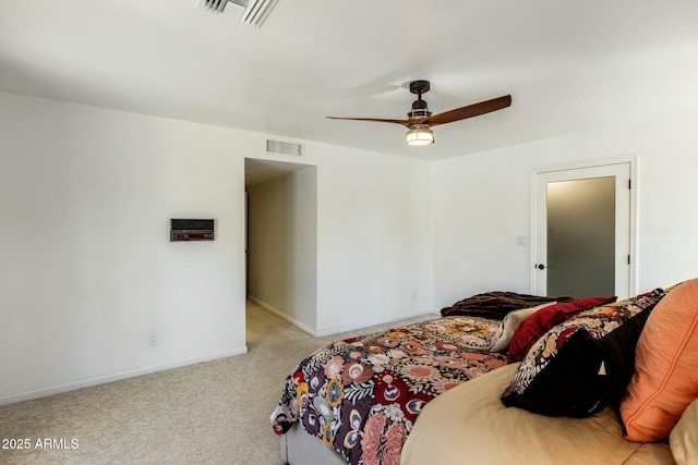 bedroom featuring light carpet, a ceiling fan, visible vents, and baseboards