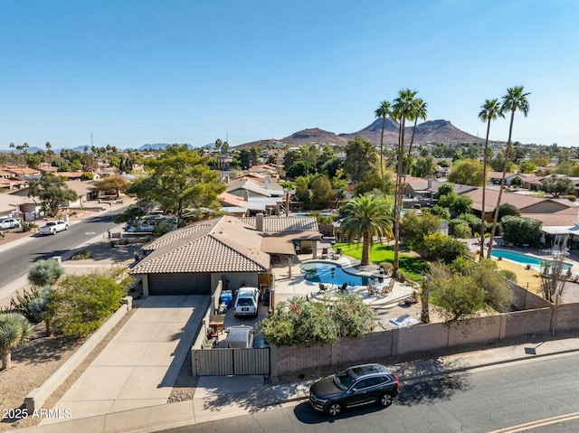 birds eye view of property featuring a residential view and a mountain view